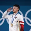 Atlet angkat besi Indonesia Rizki Juniansyah yang turun di nomor 73 kg pada Olimpiade Paris 2024 sukses